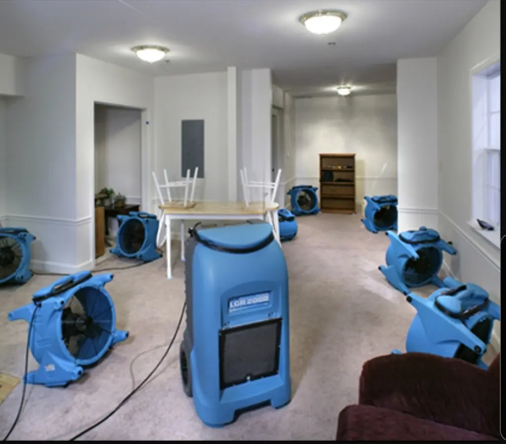 Air movers and dehumidifier setup for Water Damage Restoration in Stonegate